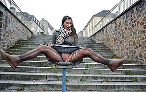 Ripped pantyhose beauty shows her sexy slit while chilling outdoors